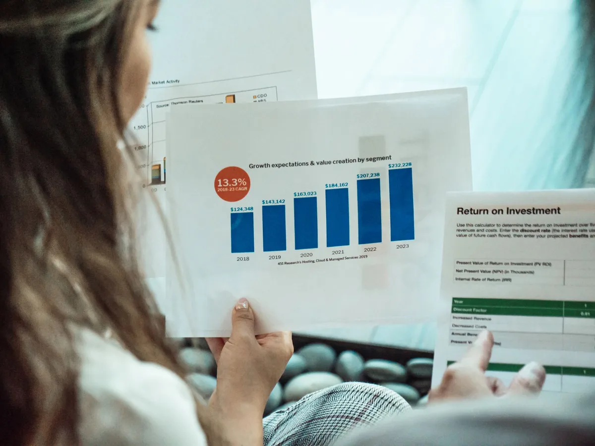 Rising bar chart showing investment growth comparison