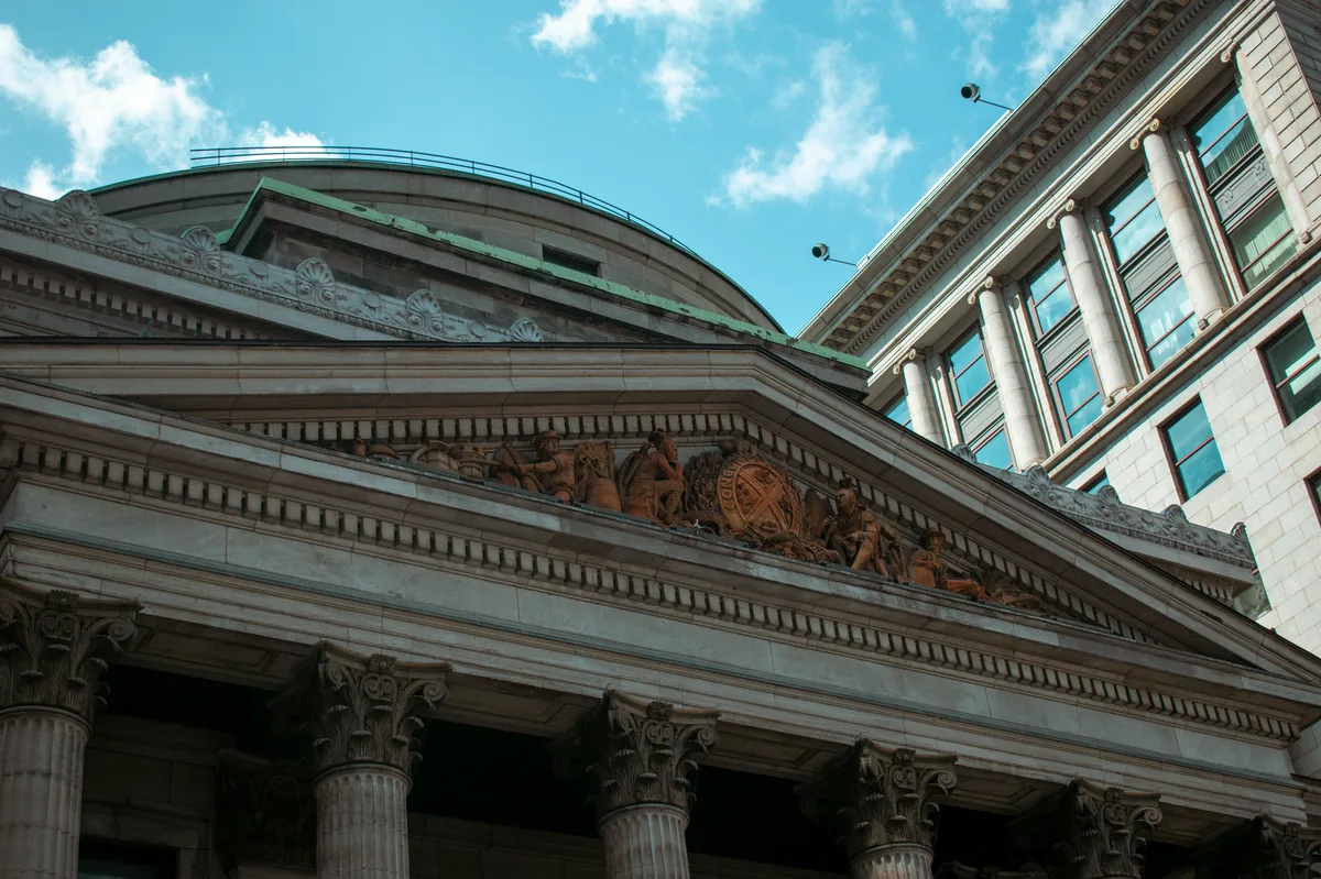 Secure banking institution building exterior representing financial security and fraud protection