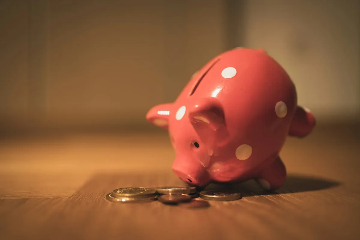 Piggy bank with Australian coins representing savings strategy planning