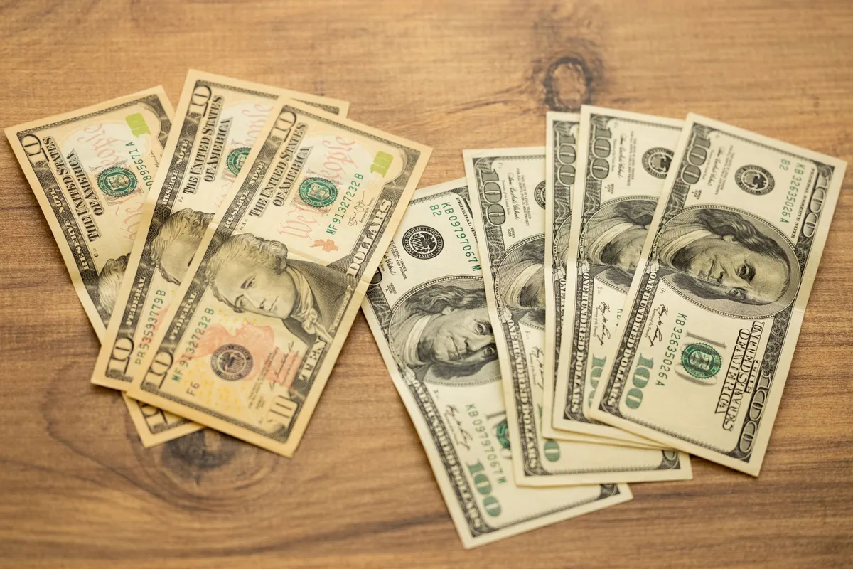 Close-up of Canadian dollar bills representing money saving strategies