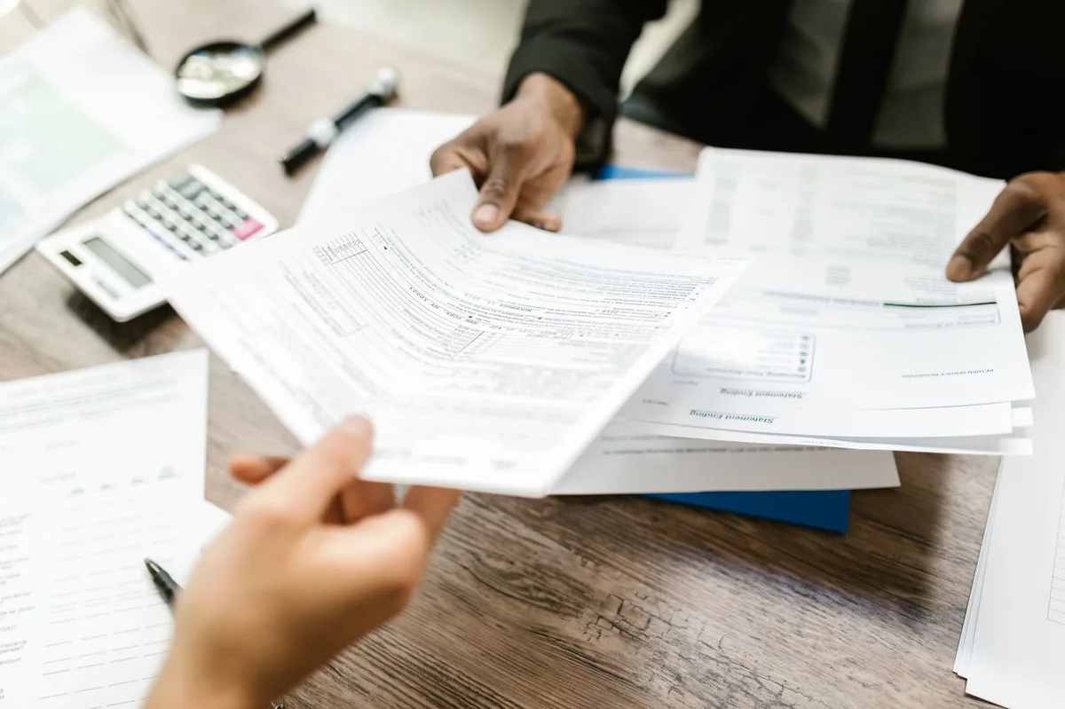 Close-up of tax documents and paperwork on a desk