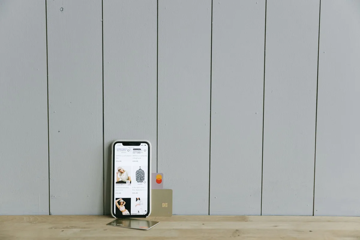 Person checking credit score on smartphone banking app