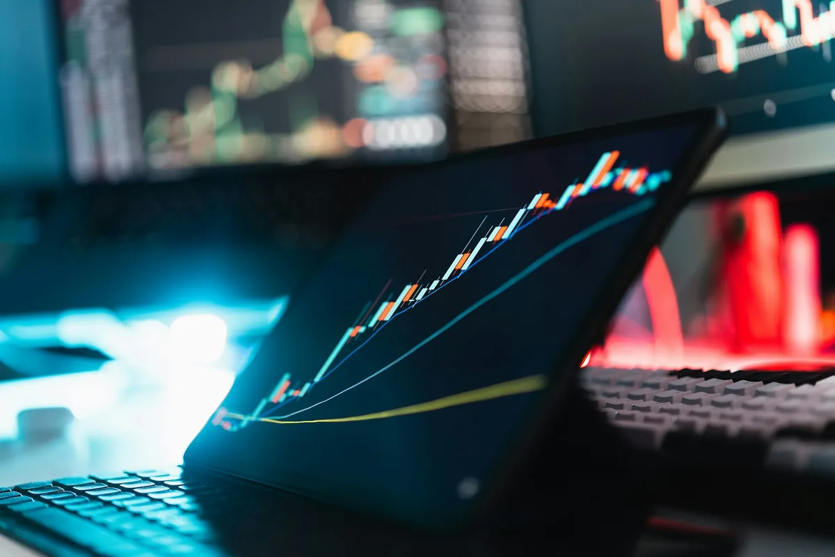 Investment graph showing upward trend on financial charts