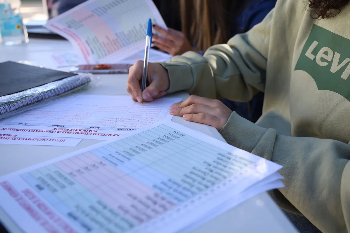 Education planning documents and pen on desk