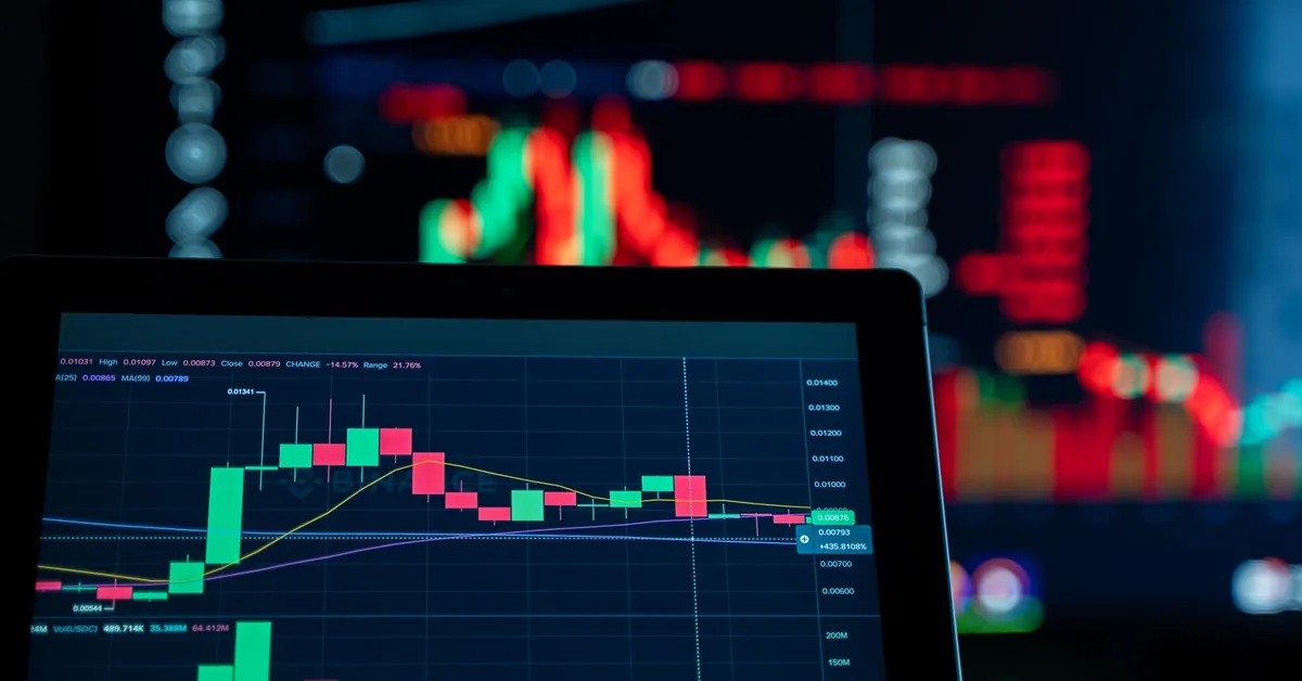 Investment planning workspace with financial documents, calculator, and charts on a desk