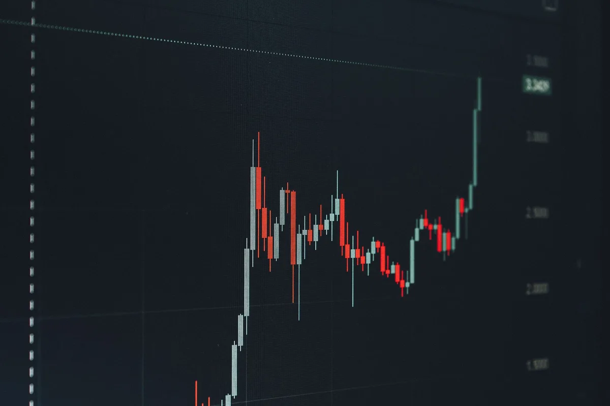 Rising bar chart showing upward financial growth trend